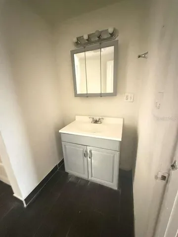a bathroom with a sink and a toilet