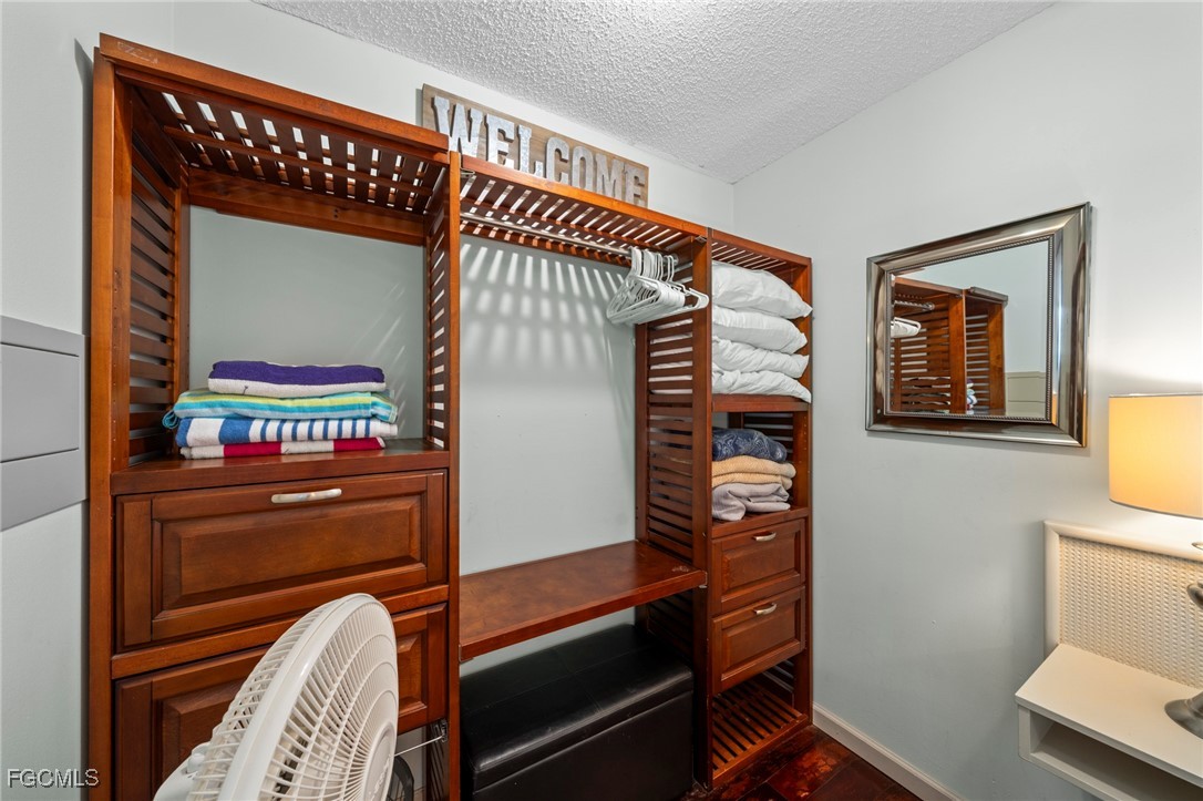 5600 Bonita Beach Road Southwest, Unit 204 Bonita Springs, FL 34134 - Photo 13 of 23 a room with storage and utility