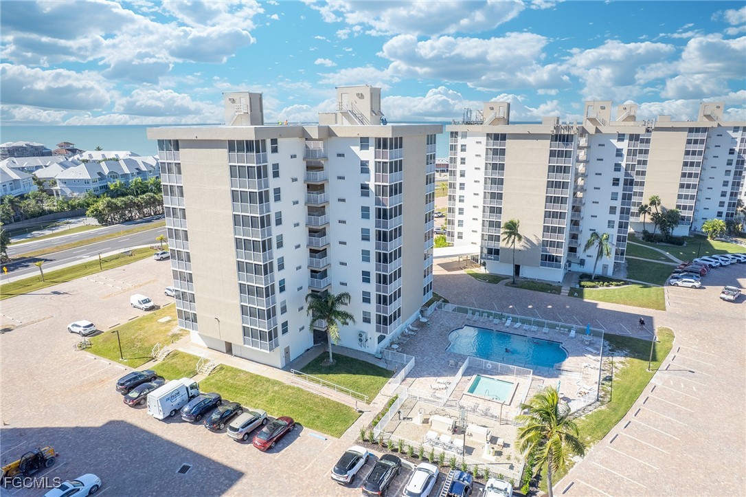 5600 Bonita Beach Road Southwest, Unit 204 Bonita Springs, FL 34134 - Photo 18 of 23 a picture of a table and chairs in the terrace