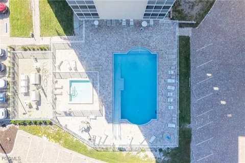a view of a swimming pool with a patio