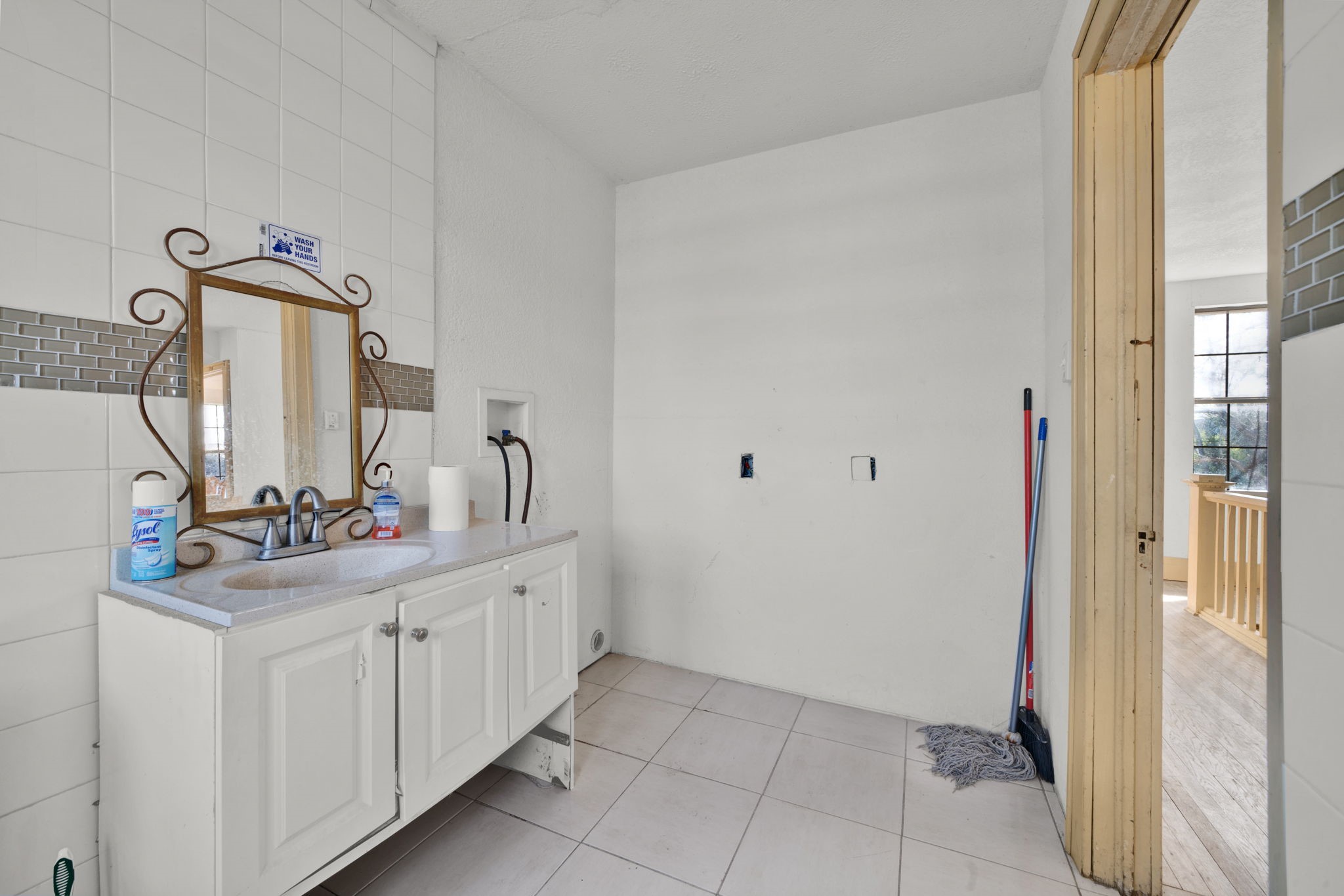 3727 Broadway Street Houston, TX 77017 - Photo 14 of 43 a bathroom with a sink and a mirror