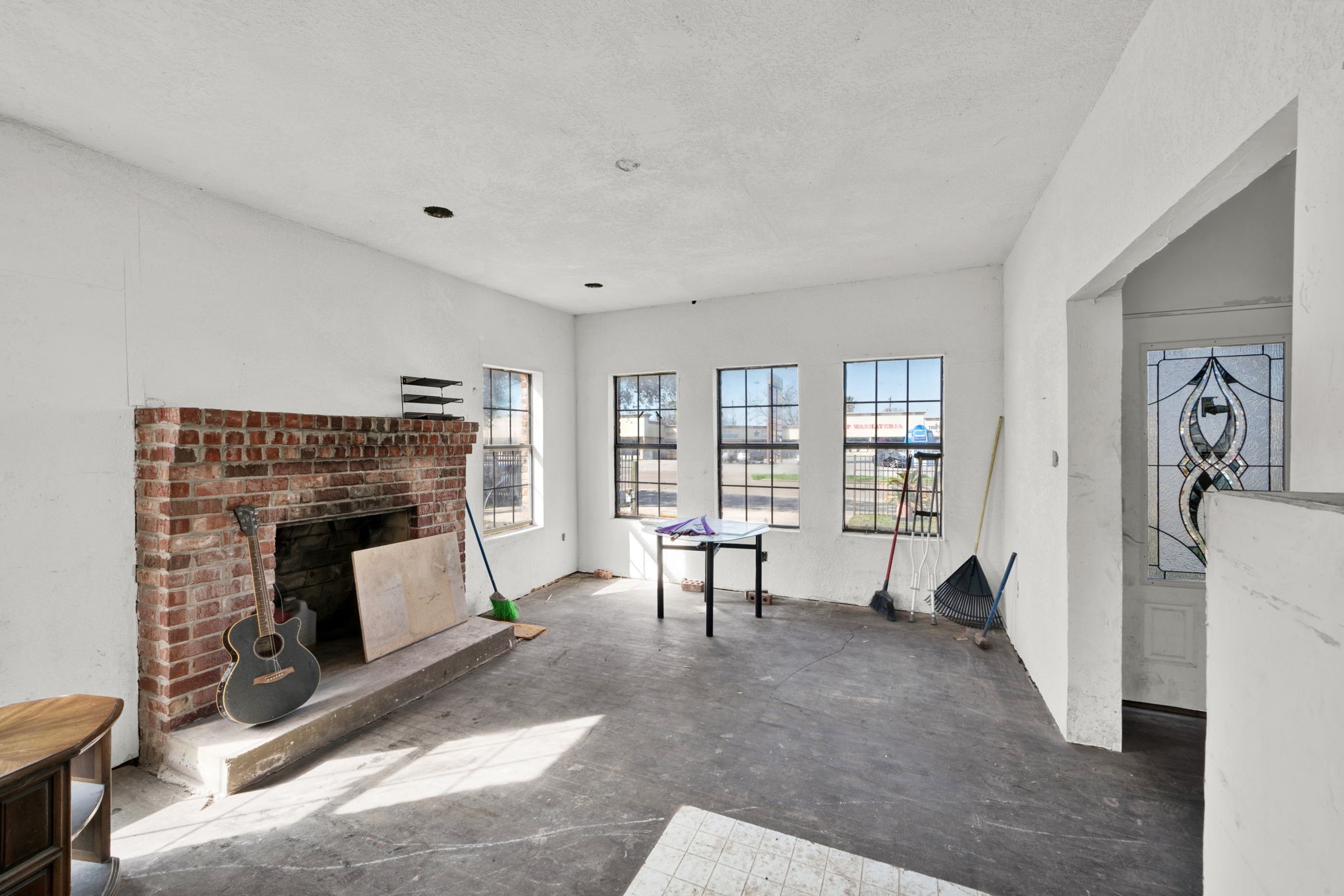 3727 Broadway Street Houston, TX 77017 - Photo 16 of 43 a living room with furniture and a fireplace