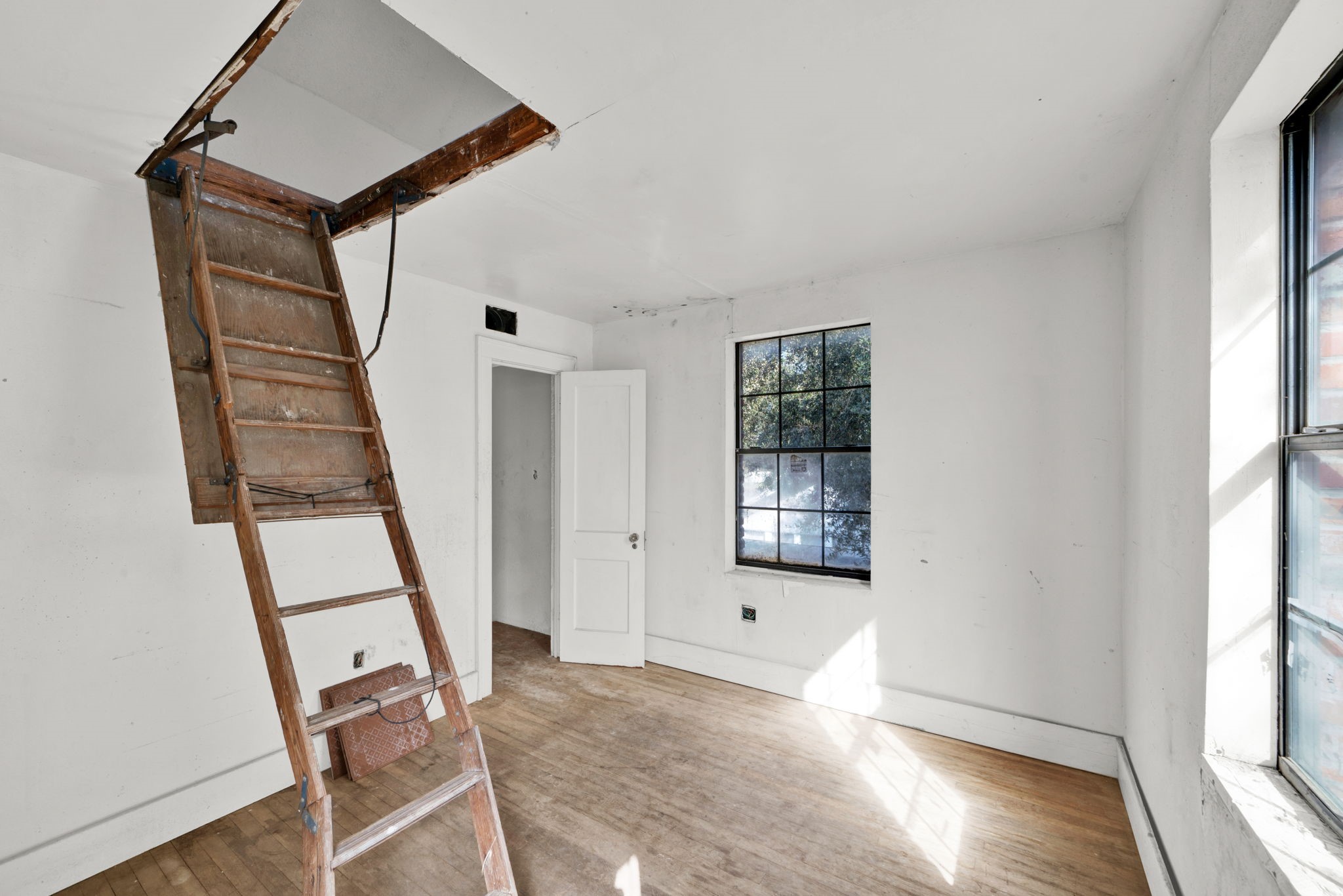 3727 Broadway Street Houston, TX 77017 - Photo 27 of 43 a view of entryway with stairs and wooden floor