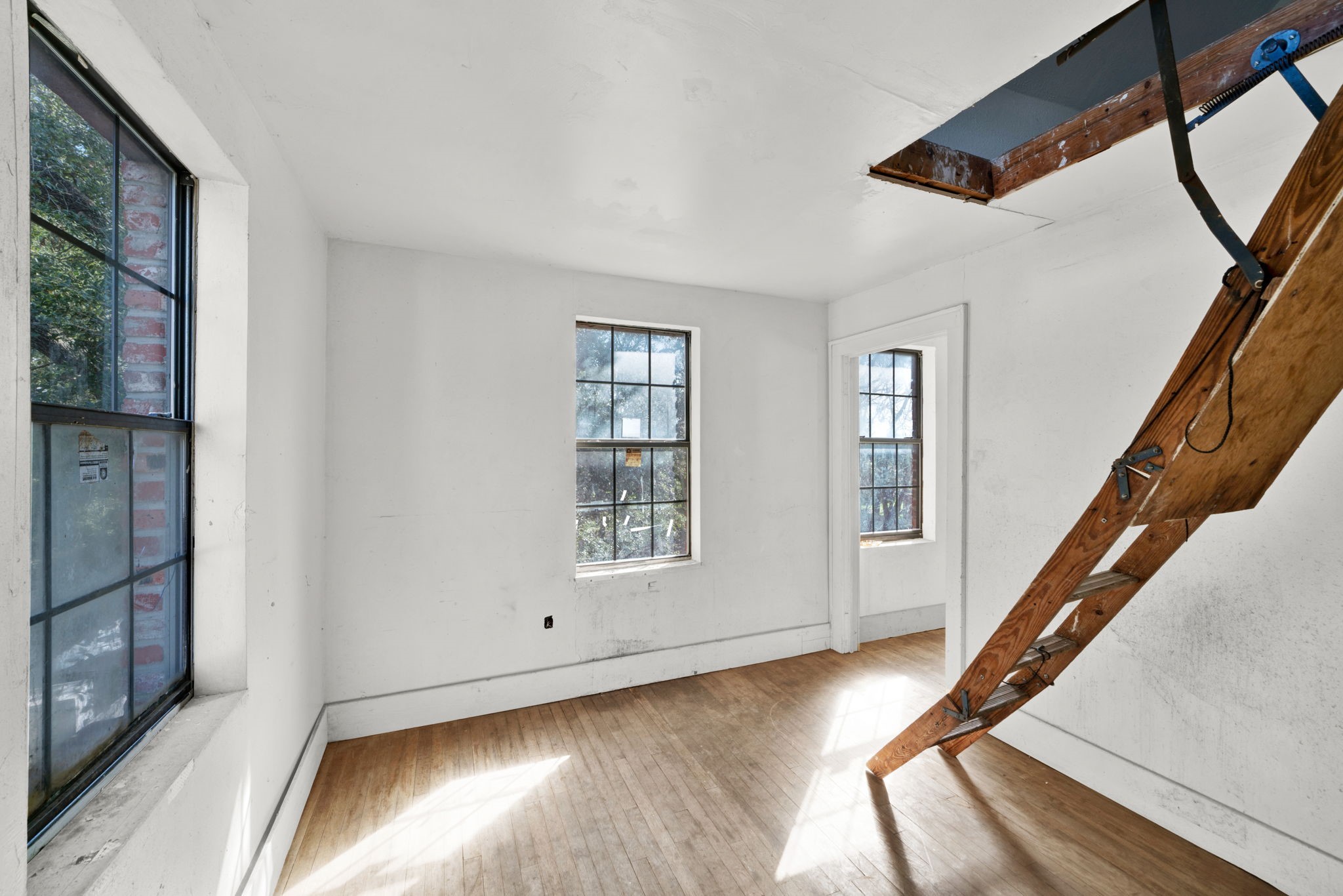 3727 Broadway Street Houston, TX 77017 - Photo 28 of 43 a view of entryway with wooden floor and stairs