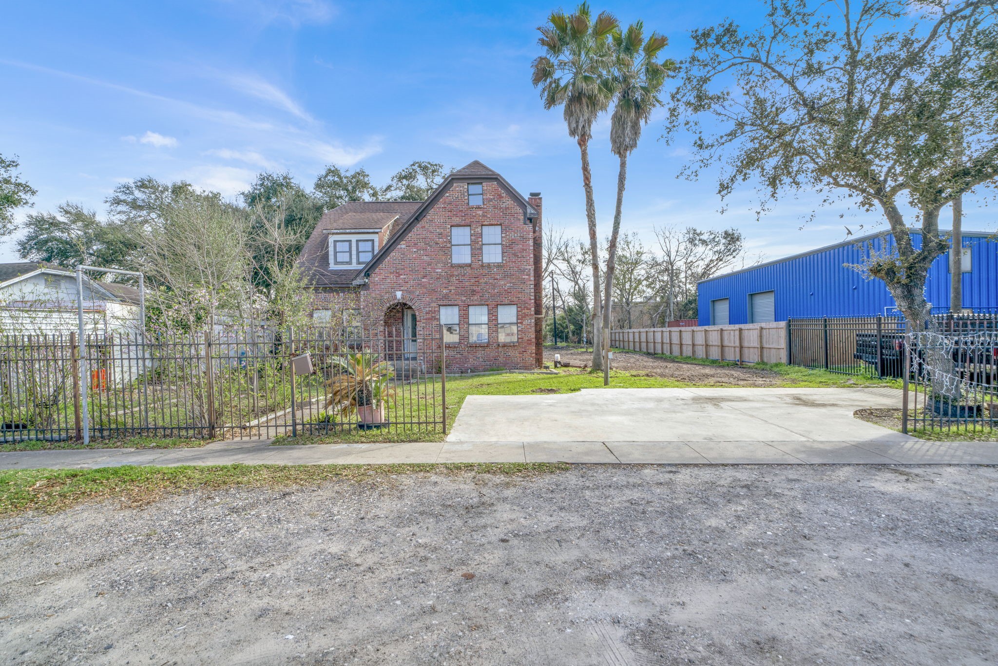 3727 Broadway Street Houston, TX 77017 - Photo 4 of 43 a view of a house with a yard and large trees