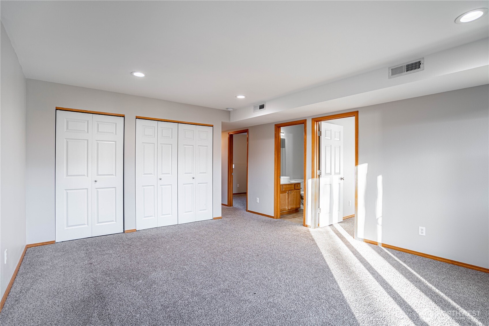 744 Wapato Way, Unit A Manson, WA 98831 - Photo 21 of 32 a view of empty room with wooden floor