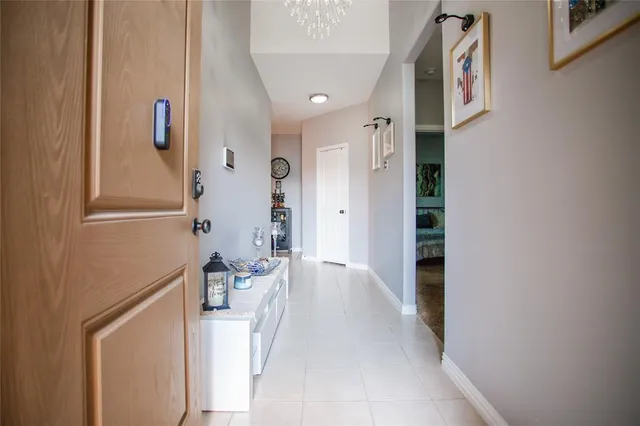 a livingroom with furniture and a dining table