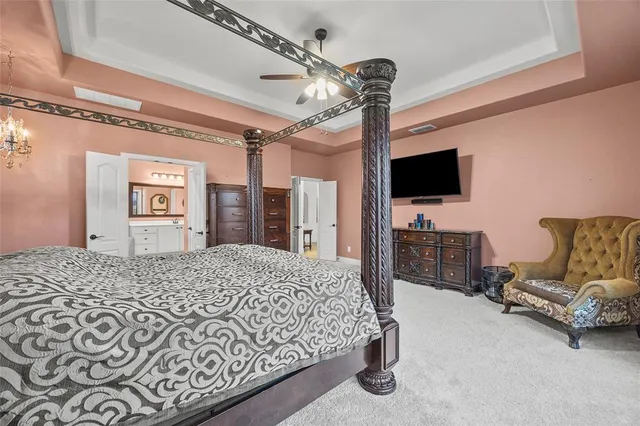 a view of cabinets with window and sink