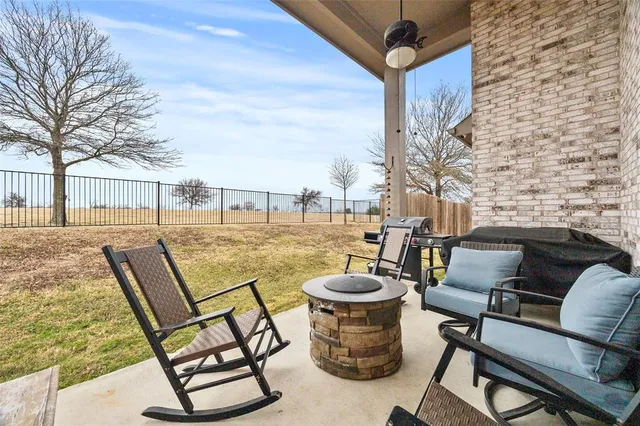 a view of backyard with green space