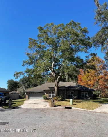 a view of a playground with basketball court