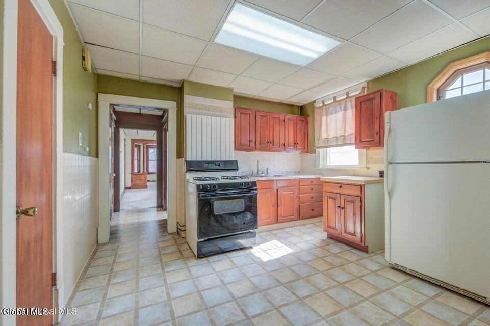 56 Ten Eyck Avenue, Unit 2 Albany, NY 12209 - Photo 12 of 18 kitchen into livingroom