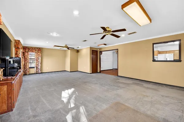 a large space with stainless steel appliances granite countertop lots of counter top space