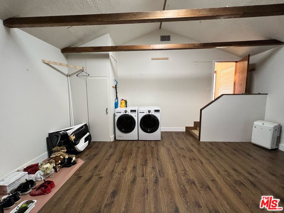 5757 Vesper Avenue Van Nuys, CA 91411 - Photo 13 of 18 a bedroom with a bed and a dresser