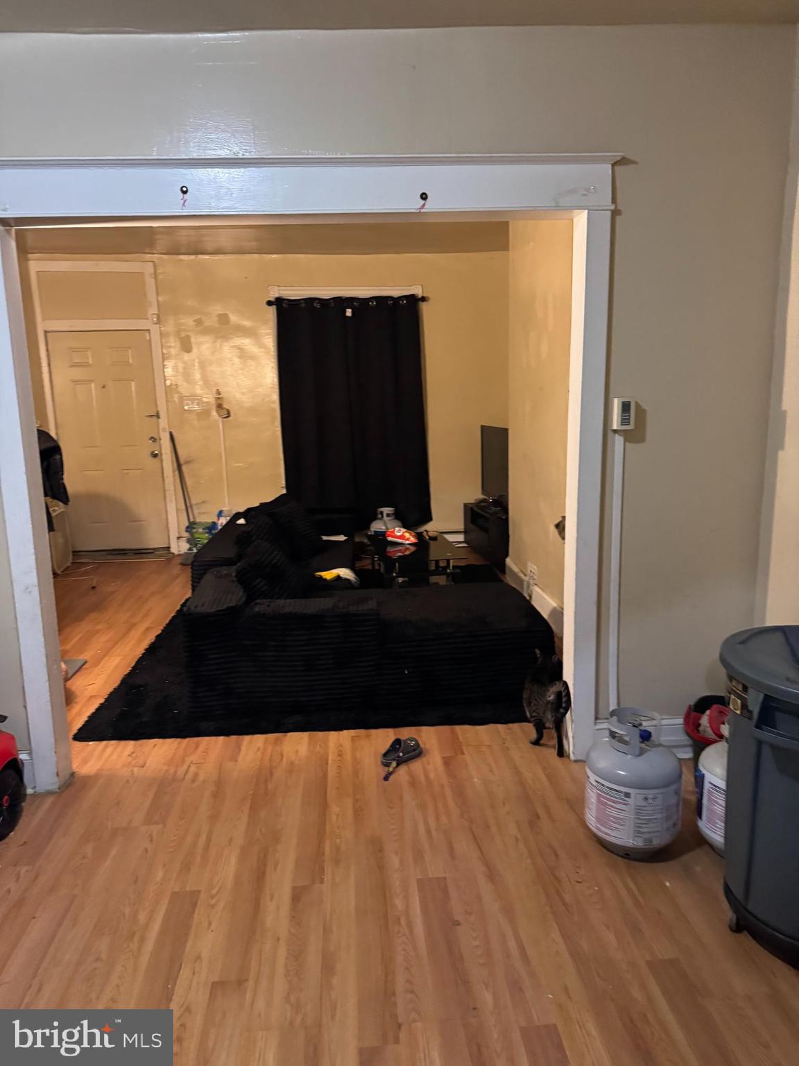 6356 Wheeler Street Philadelphia, PA 19142 - Photo 2 of 9 a bedroom with a bed and window