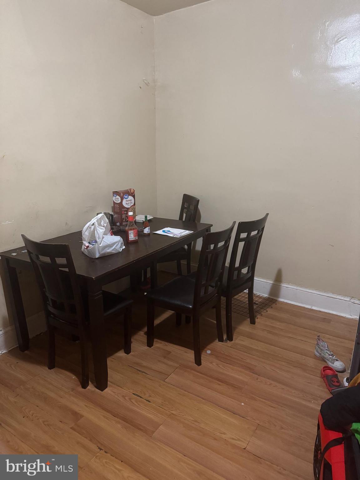 6356 Wheeler Street Philadelphia, PA 19142 - Photo 4 of 9 a living room with furniture and wooden floor