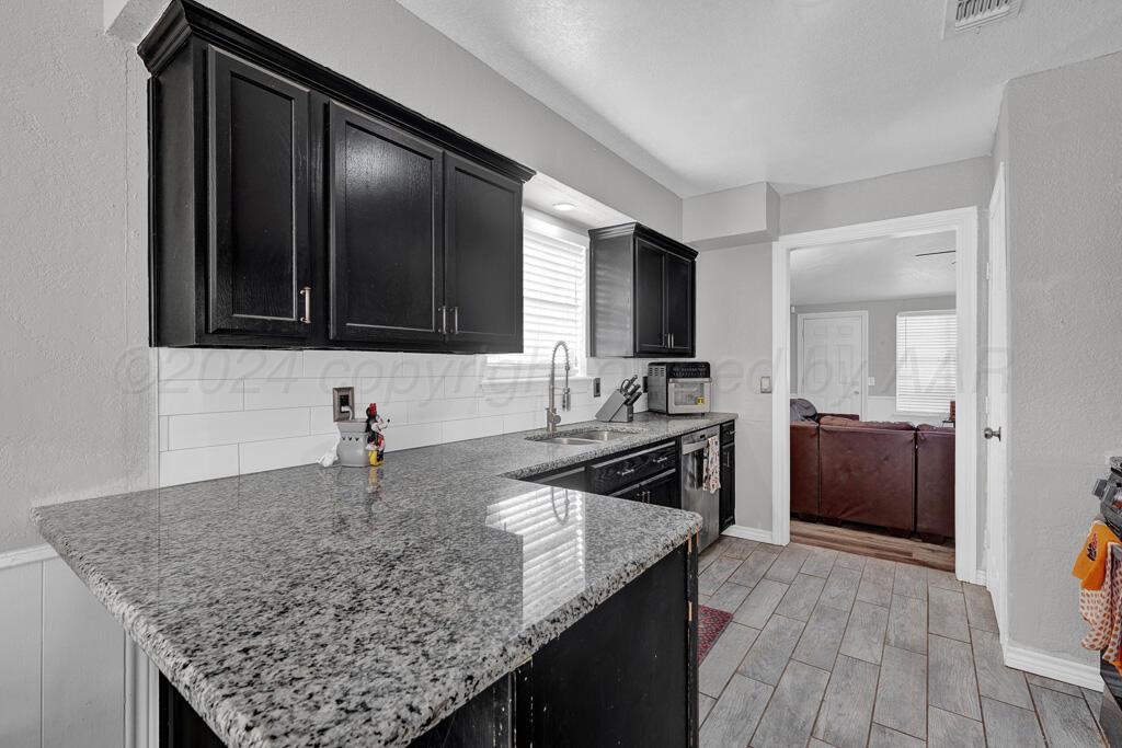 1016 Trinchera Drive Amarillo, TX 79110 - Photo 5 of 18 kitchen 2