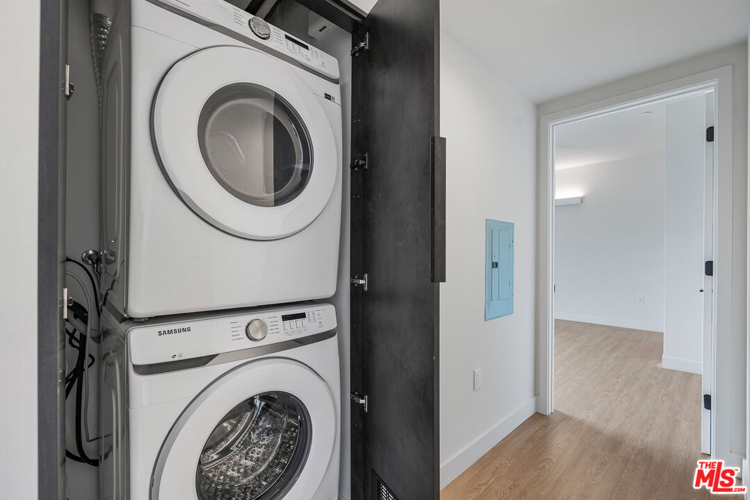 3688 Overland Avenue, Unit 521 Los Angeles, CA 90034 - Photo 12 of 31 a view of washer and dryer in a utility room