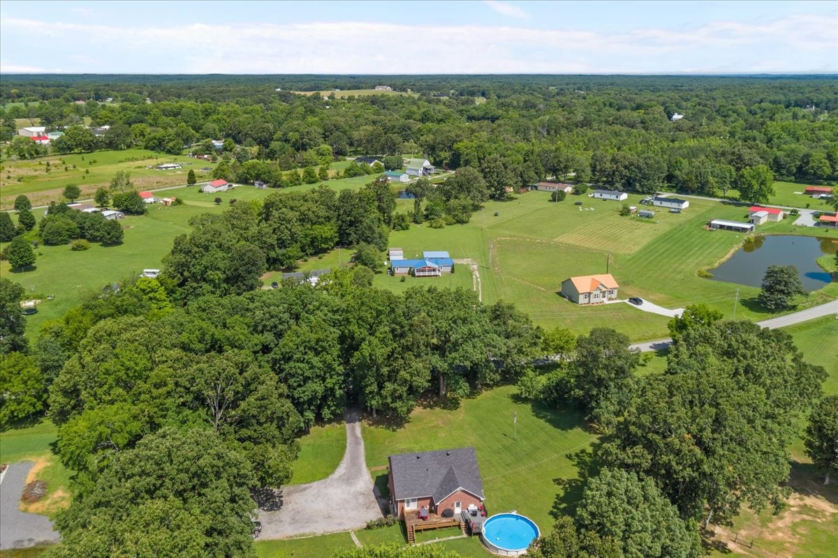 1112 Garners Creek Road Dickson, TN 37055 - Photo 2 of 57 an aerial view of a houses with a yard