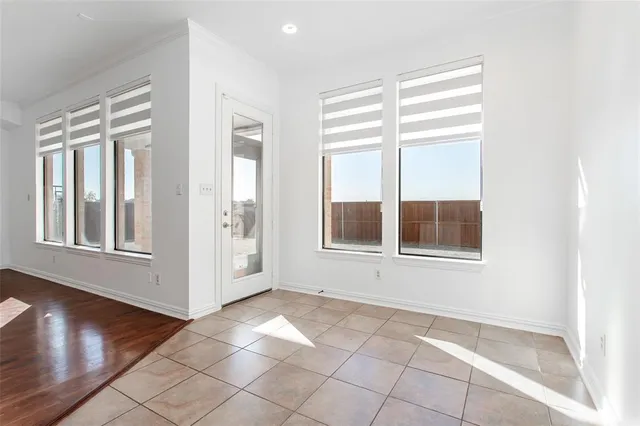 a kitchen with stainless steel appliances a stove a sink and a refrigerator