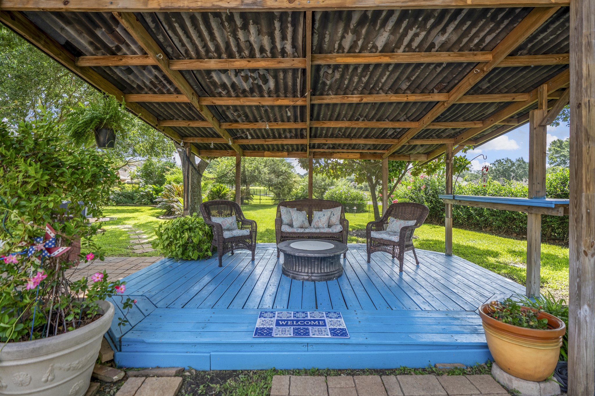 5807 Sequoia Trace Court Spring, TX 77379 - Photo 36 of 50 The covered gazebo creates a shaded spot to unwind between swims, grill nights, or slow afternoons outside, with golf course views and lush backyard scenery extending just beyond the deck.