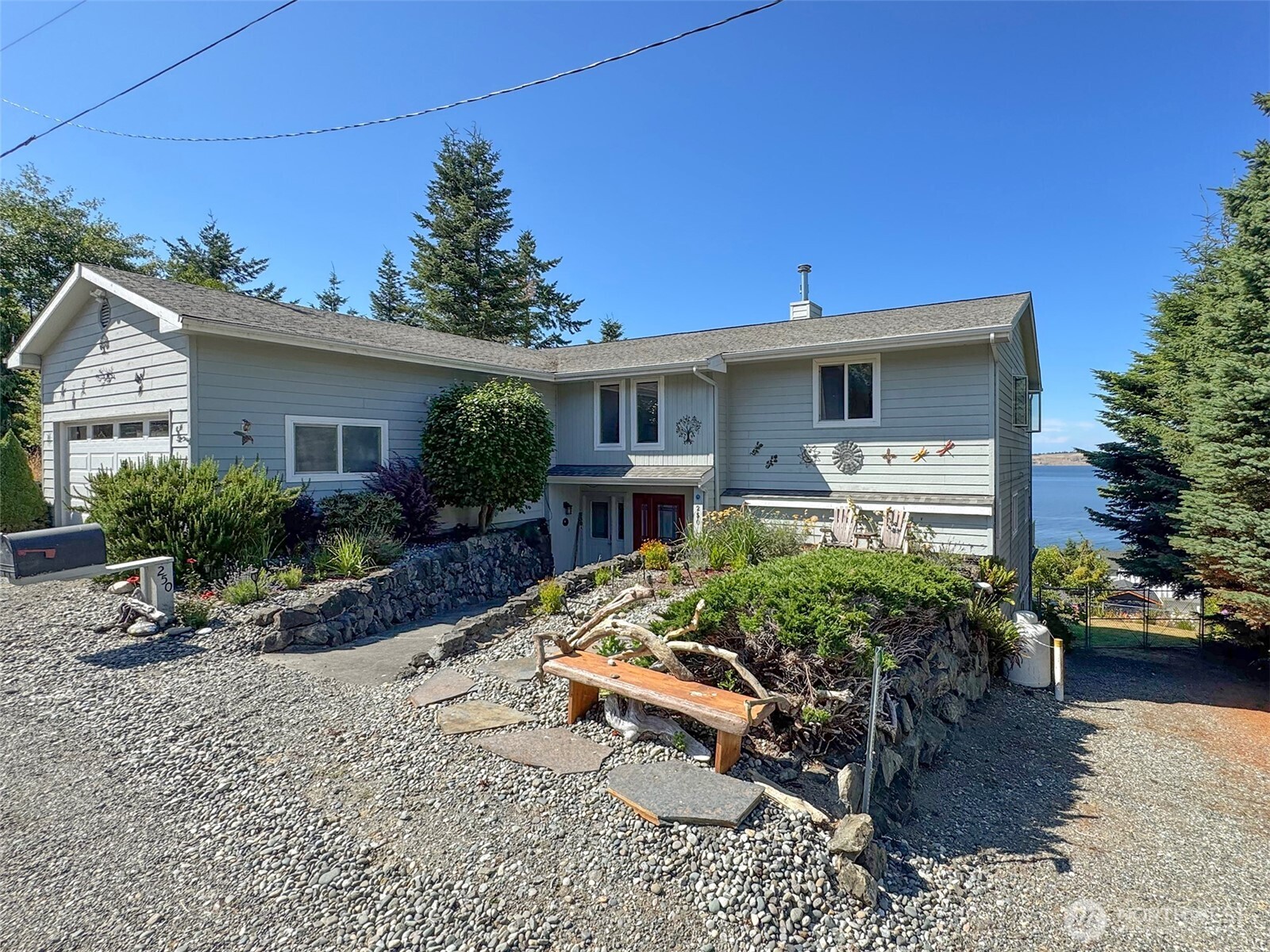 250 North Street, Unit A Sequim, WA 98382 - Photo 1 of 40 a front view of a house with garden