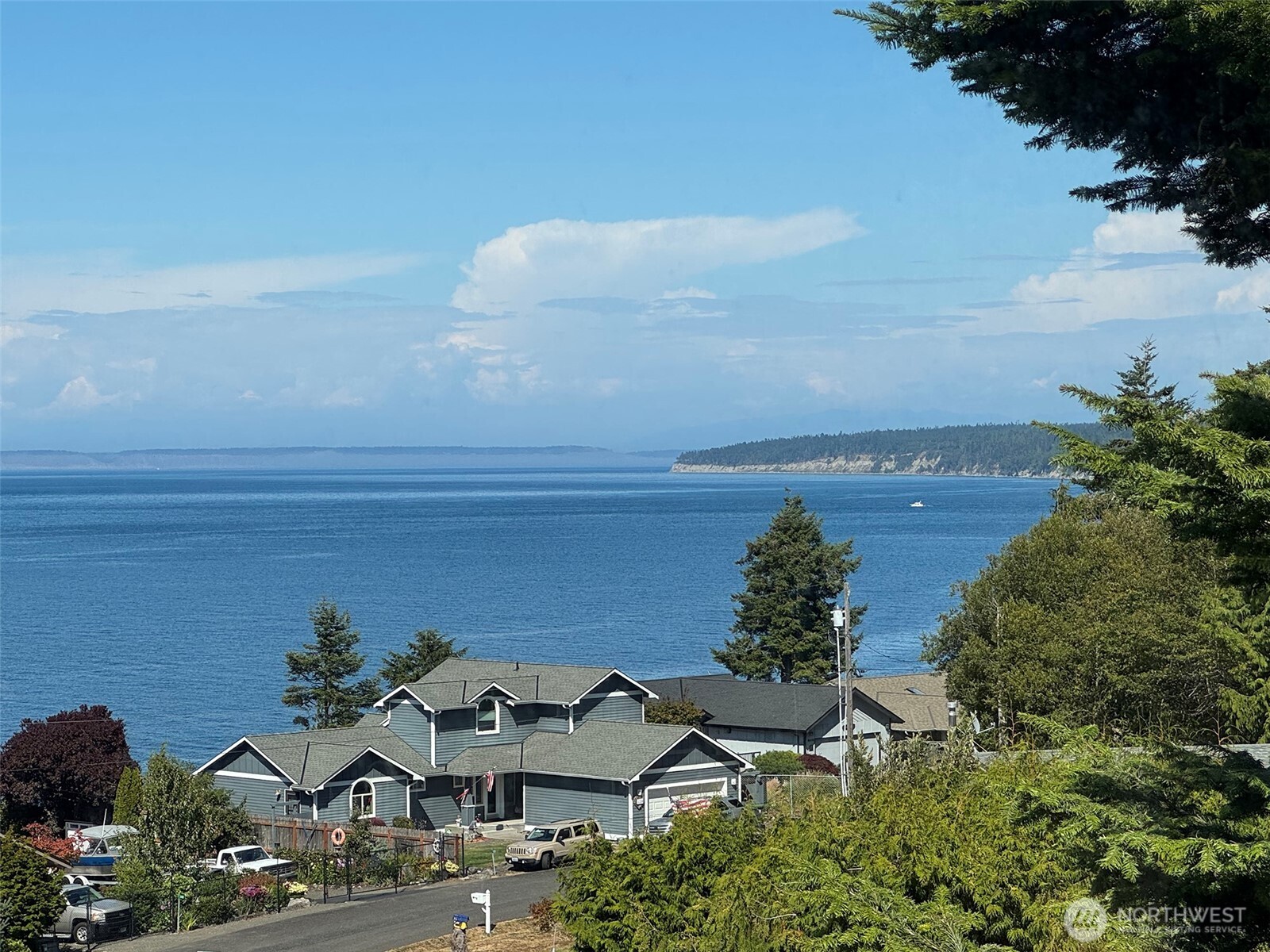 250 North Street, Unit A Sequim, WA 98382 - Photo 35 of 40 a view of a lake with an outdoor space