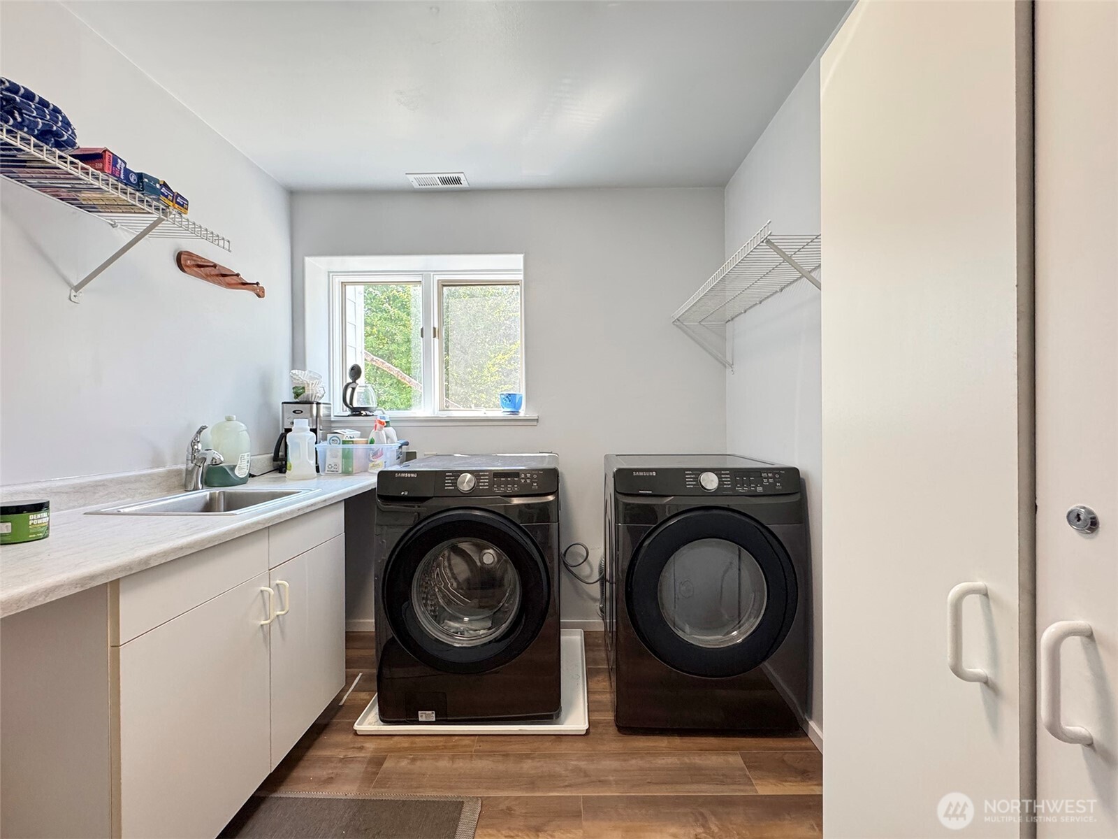 250 North Street, Unit A Sequim, WA 98382 - Photo 39 of 40 a utility room with sink dryer and washer
