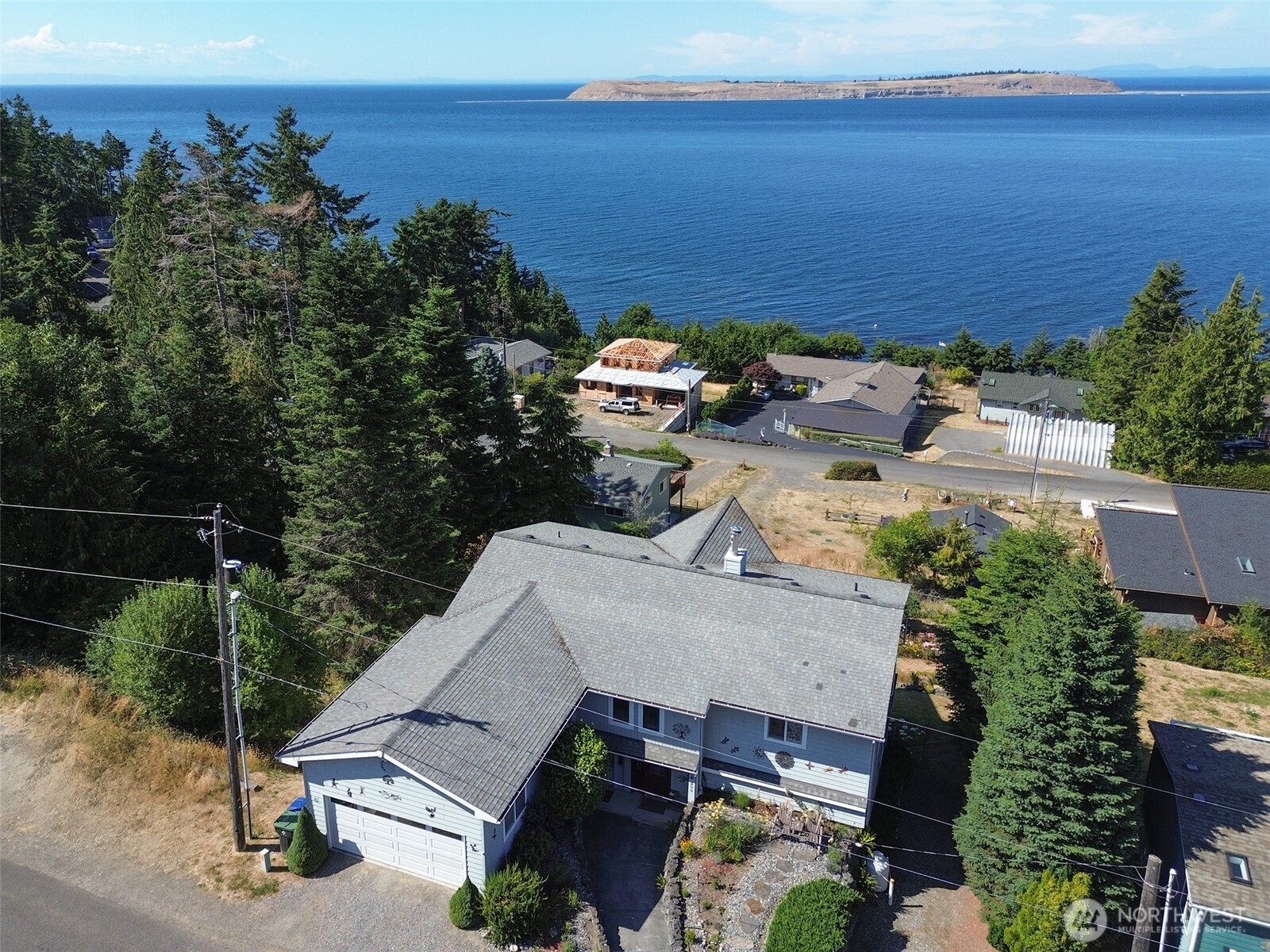 250 North Street, Unit A Sequim, WA 98382 - Photo 40 of 40 an aerial view of a house with a ocean view