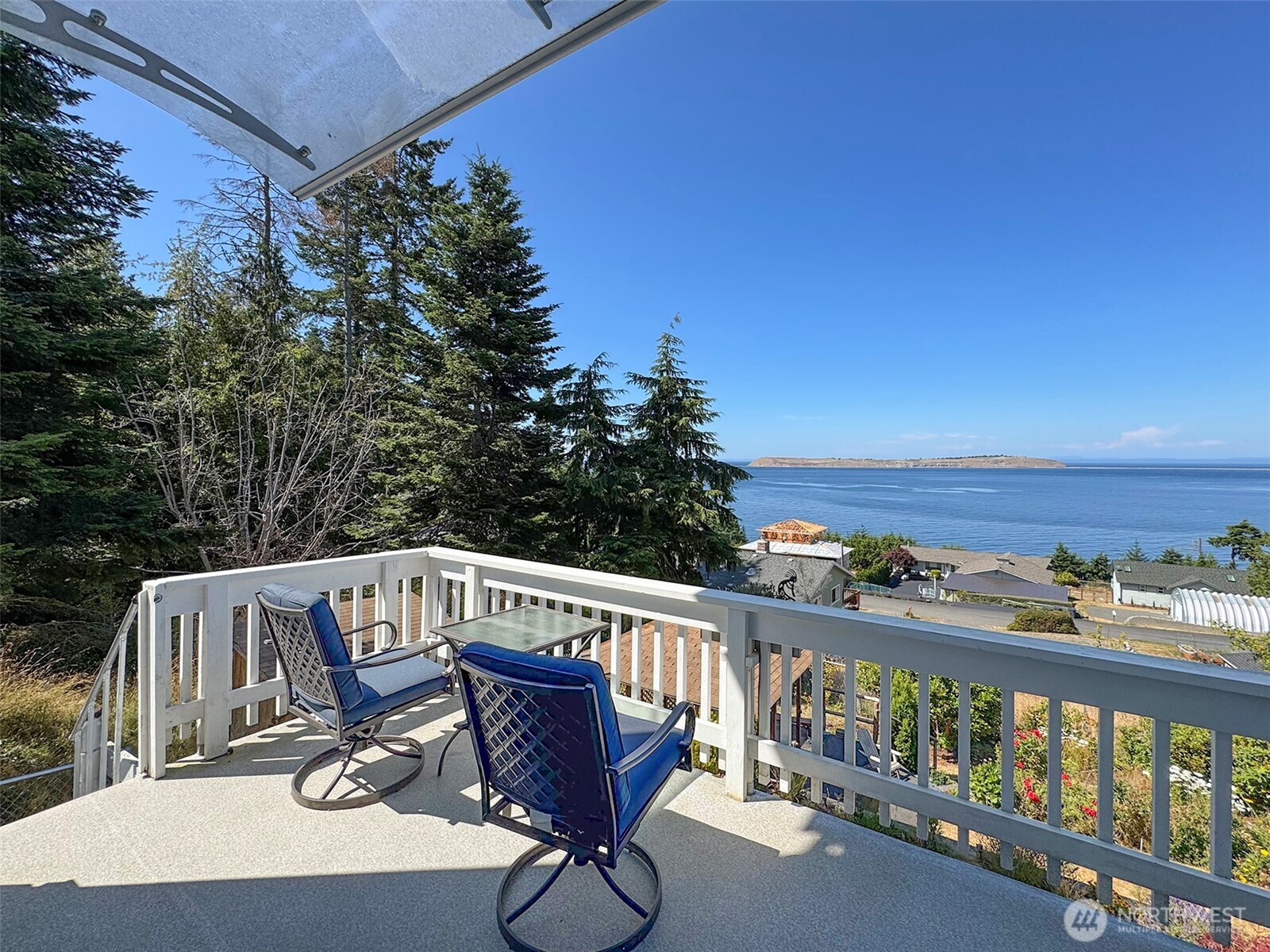 250 North Street, Unit A Sequim, WA 98382 - Photo 7 of 40 a view of a chairs and table in the balcony