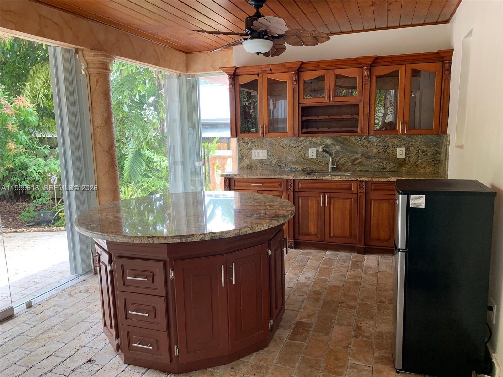 3521 Southwest 23rd Street, Unit 3521 Miami, FL 33145 - Photo 5 of 23 glass terrace (AC)