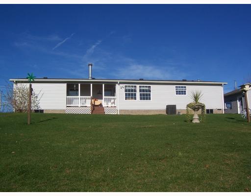 Exterior Back. THERE IS A COVERERED REAR PORCH ON THE REAR OF THE HOME.