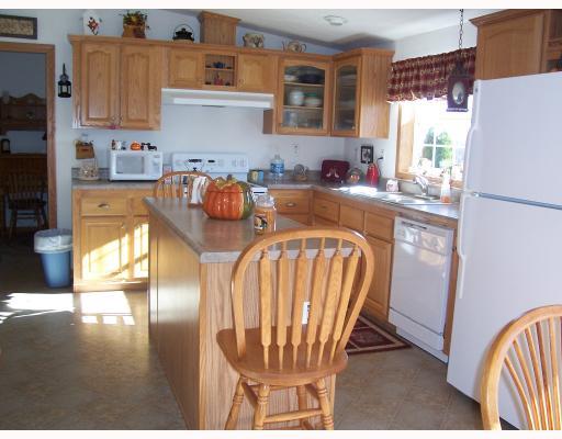 Kitchen. OPEN KITCHEN AREA AND ALL APLLIANCES STAY!