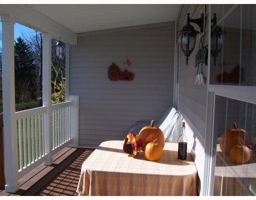 136 Ridge Avenue Beaver Falls, PA 15010 - Photo 9 of 18 Patio/Deck. NICE COVRED PORCH FOR WINDING DOWN AND READING A BOOK!