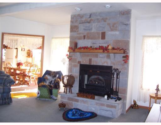 136 Ridge Avenue Beaver Falls, PA 15010 - Photo 10 of 18 Living Room. BEAUTIFUL STONE WOOD BURNING OR ELECTRIC FIREPLACE.