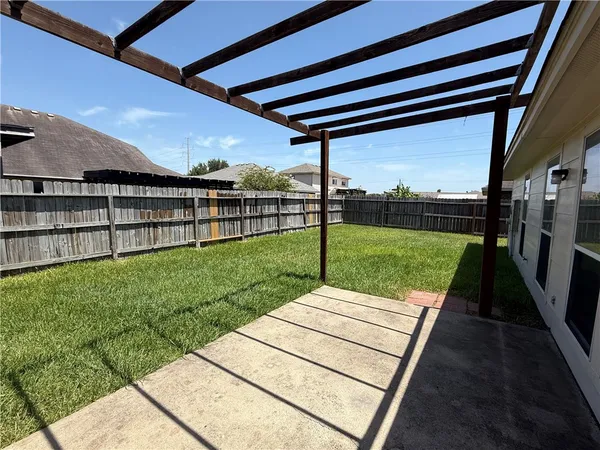 a view of a backyard with a garden