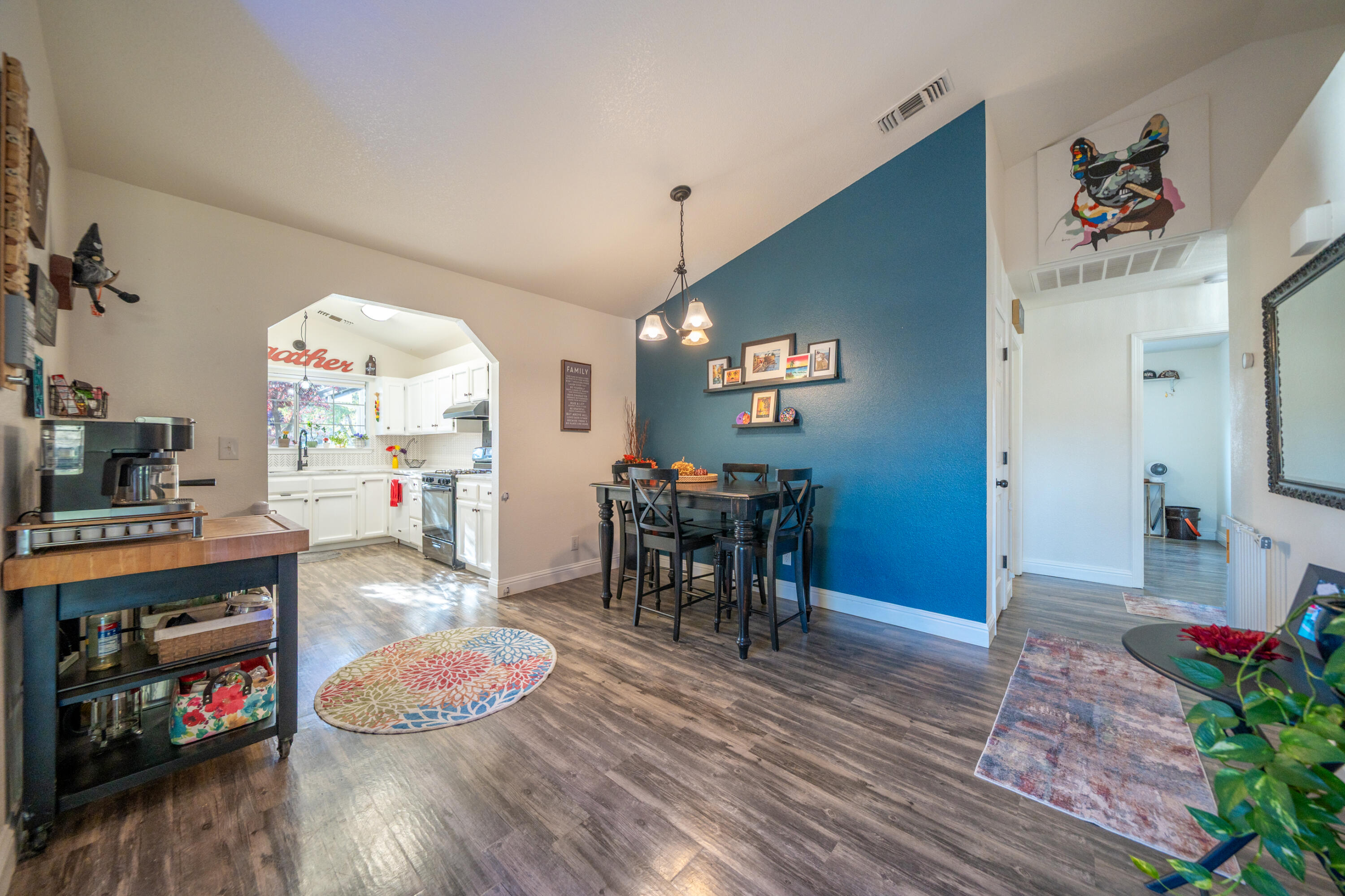 874 Spaniel Drive Redding, CA 96003 - Photo 11 of 41 a living room with furniture and wooden floor