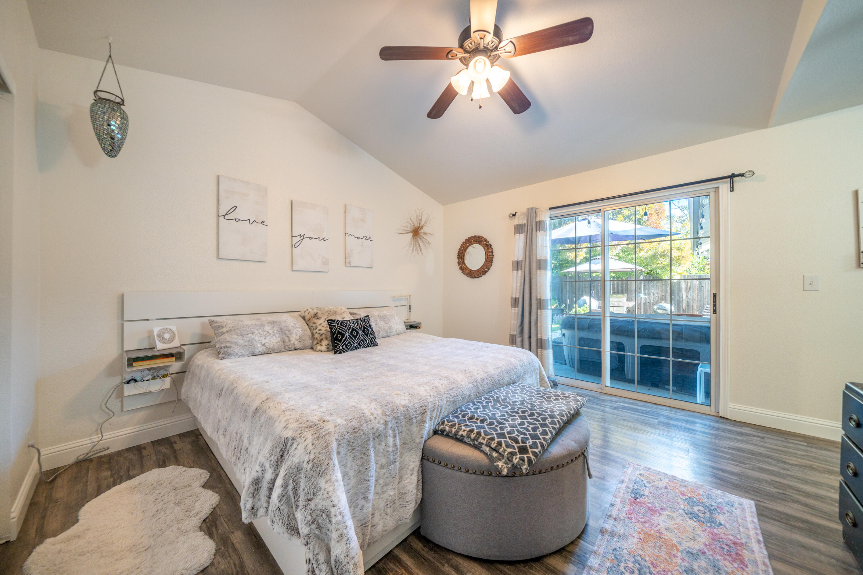 874 Spaniel Drive Redding, CA 96003 - Photo 19 of 41 a bedroom with a bed and a window