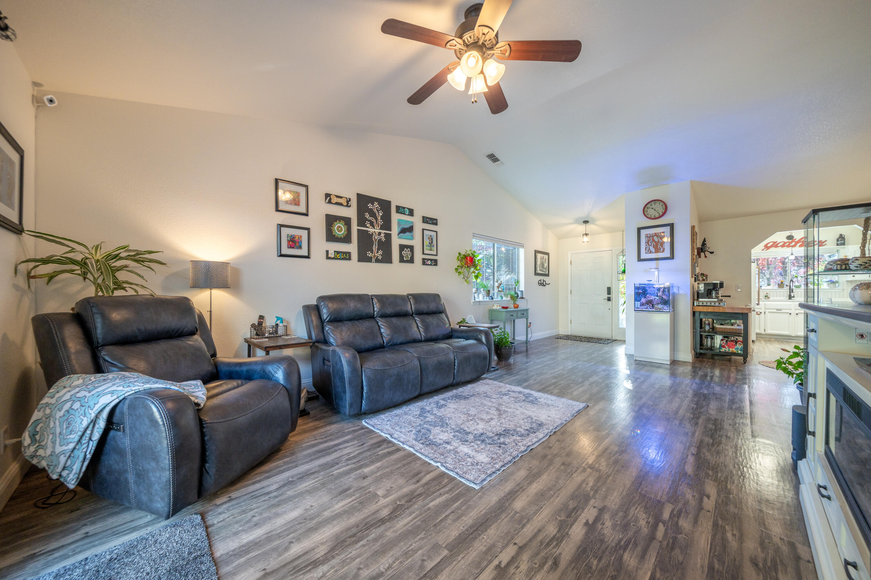 874 Spaniel Drive Redding, CA 96003 - Photo 9 of 41 a living room with furniture and wooden floor