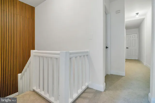 a view of a hallway with closet area