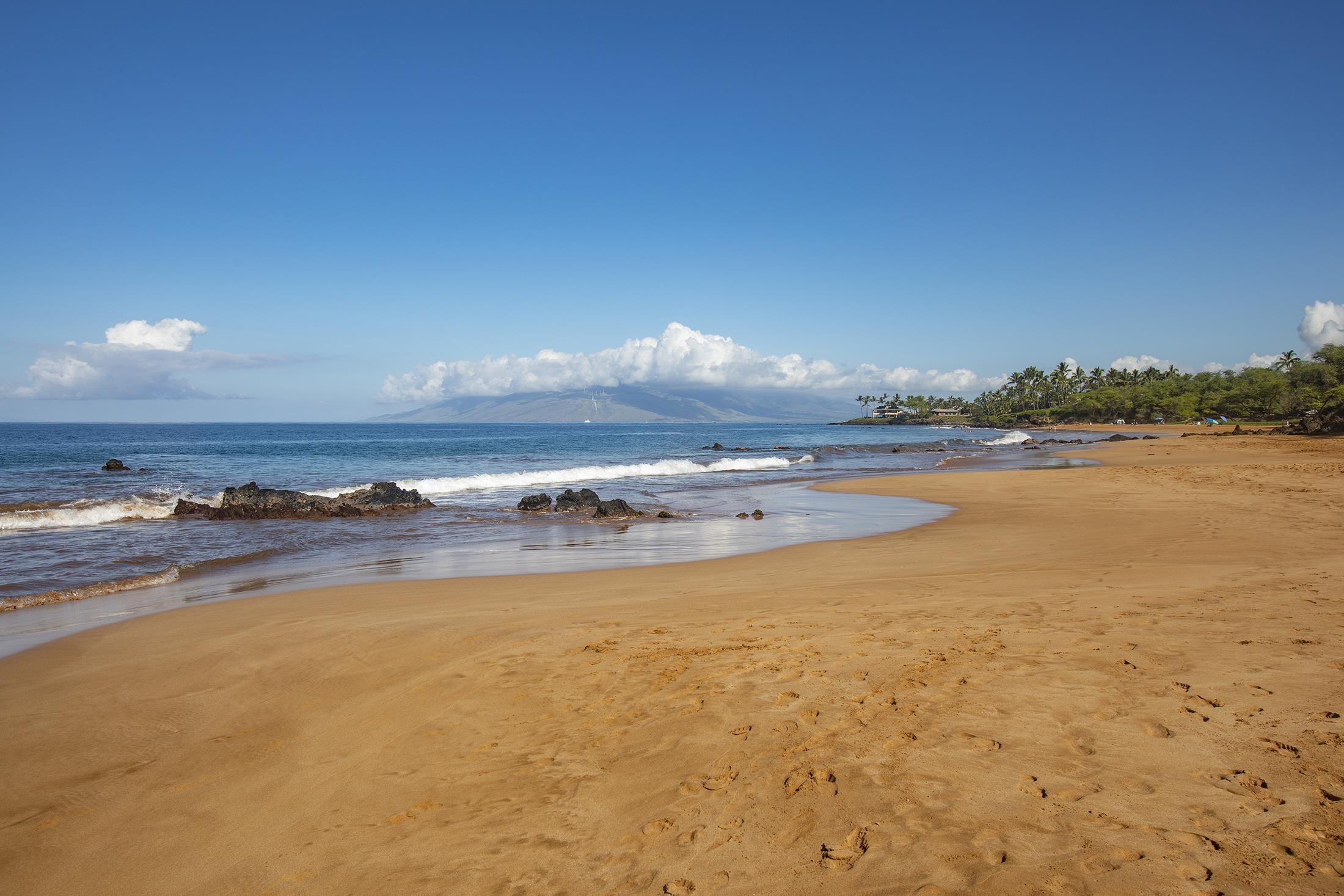 4850 Makena Alanui Road, Unit F207 Kihei, HI 96753 - Photo 24 of 34 a view of an ocean and a building