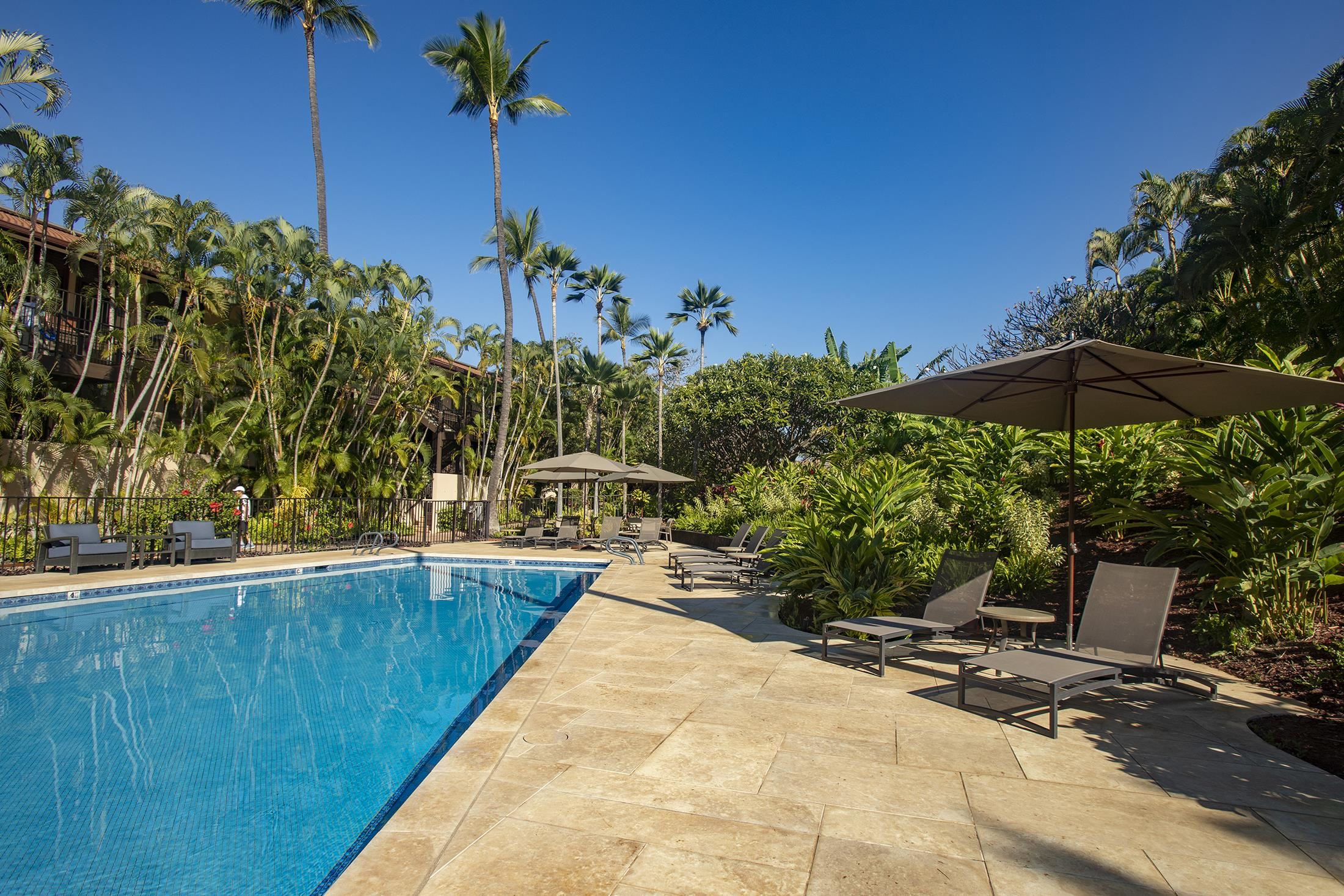 4850 Makena Alanui Road, Unit F207 Kihei, HI 96753 - Photo 32 of 34 a view of a swimming pool with a patio