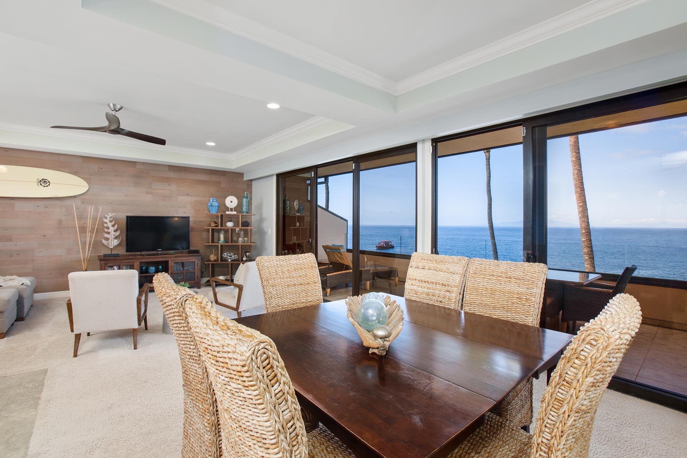 4850 Makena Alanui Road, Unit F207 Kihei, HI 96753 - Photo 7 of 34 a living room with furniture and a large window