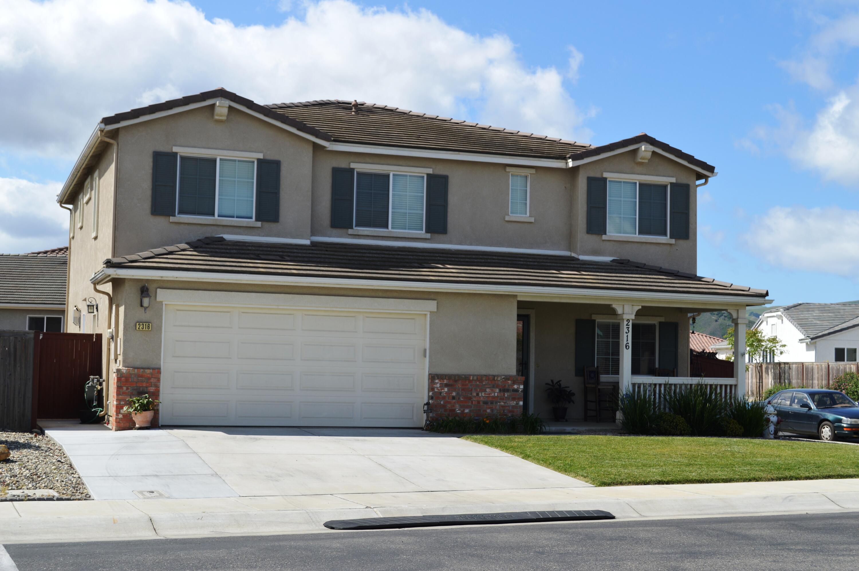2316 Point Sal Loop Lompoc, CA 93436 - Photo 1 of 36 a front view of a house with yard