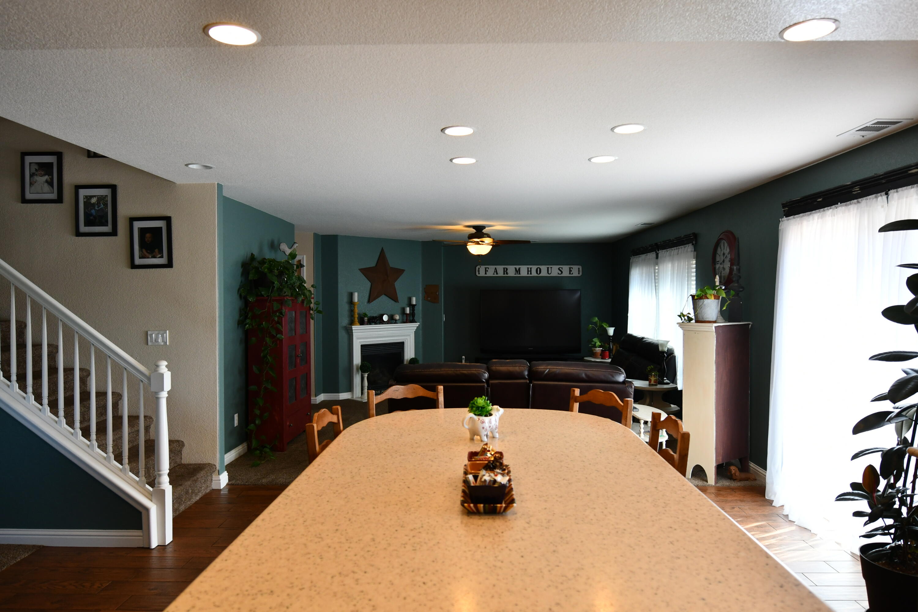 2316 Point Sal Loop Lompoc, CA 93436 - Photo 11 of 36 a projector room with furniture a flat screen tv and a large window