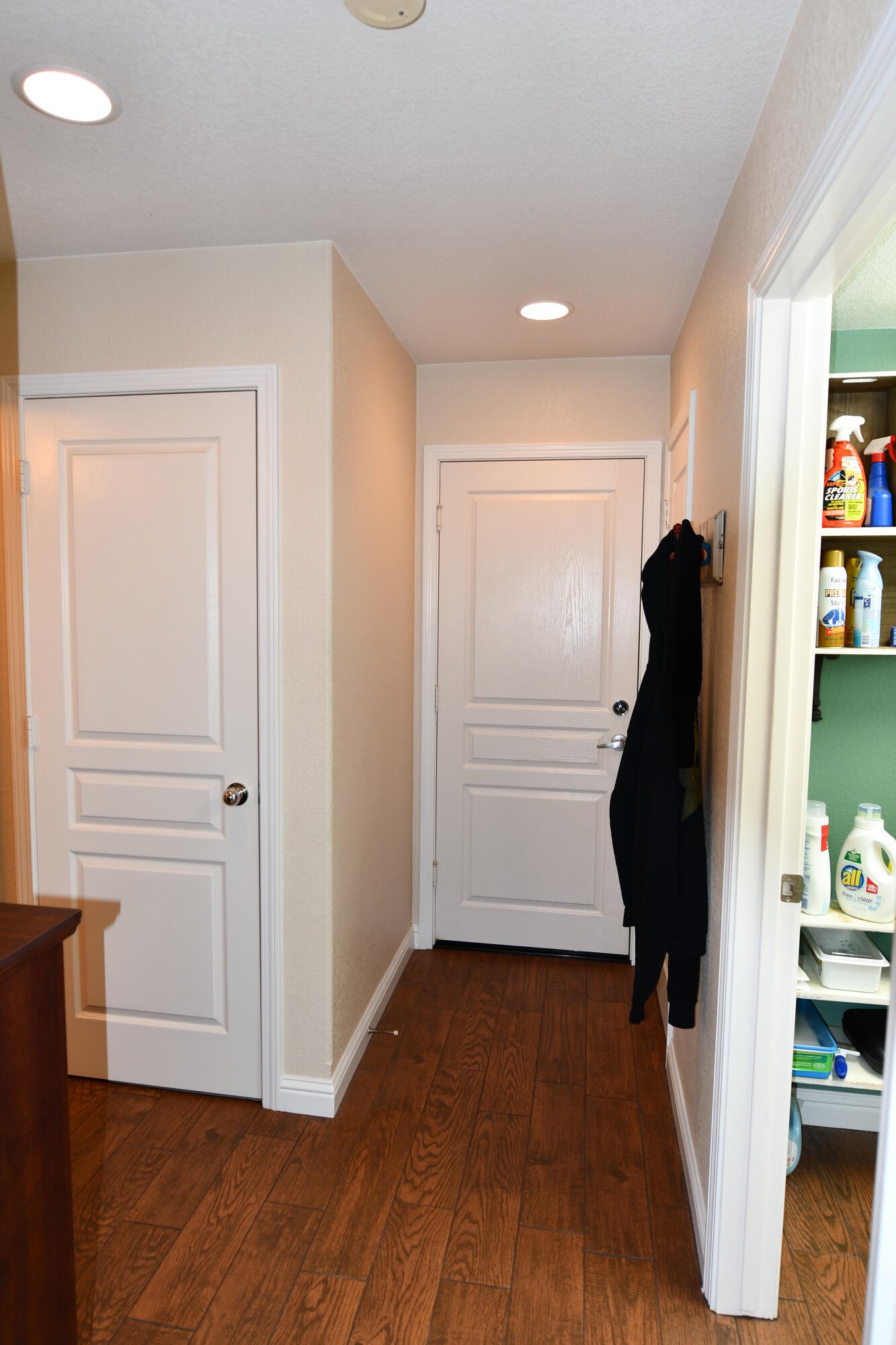 2316 Point Sal Loop Lompoc, CA 93436 - Photo 13 of 36 a view of a closet with wooden floor and cabinet