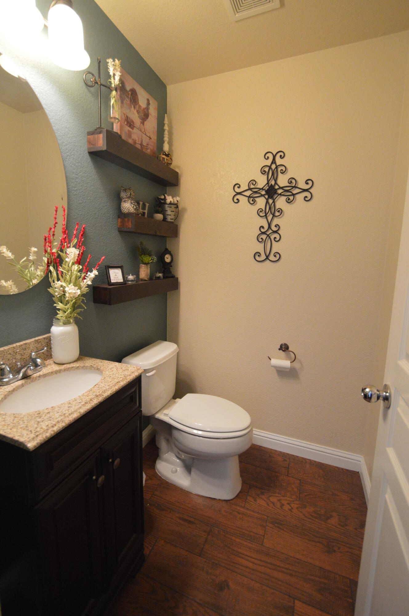2316 Point Sal Loop Lompoc, CA 93436 - Photo 16 of 36 a bathroom with a toilet a sink and mirror