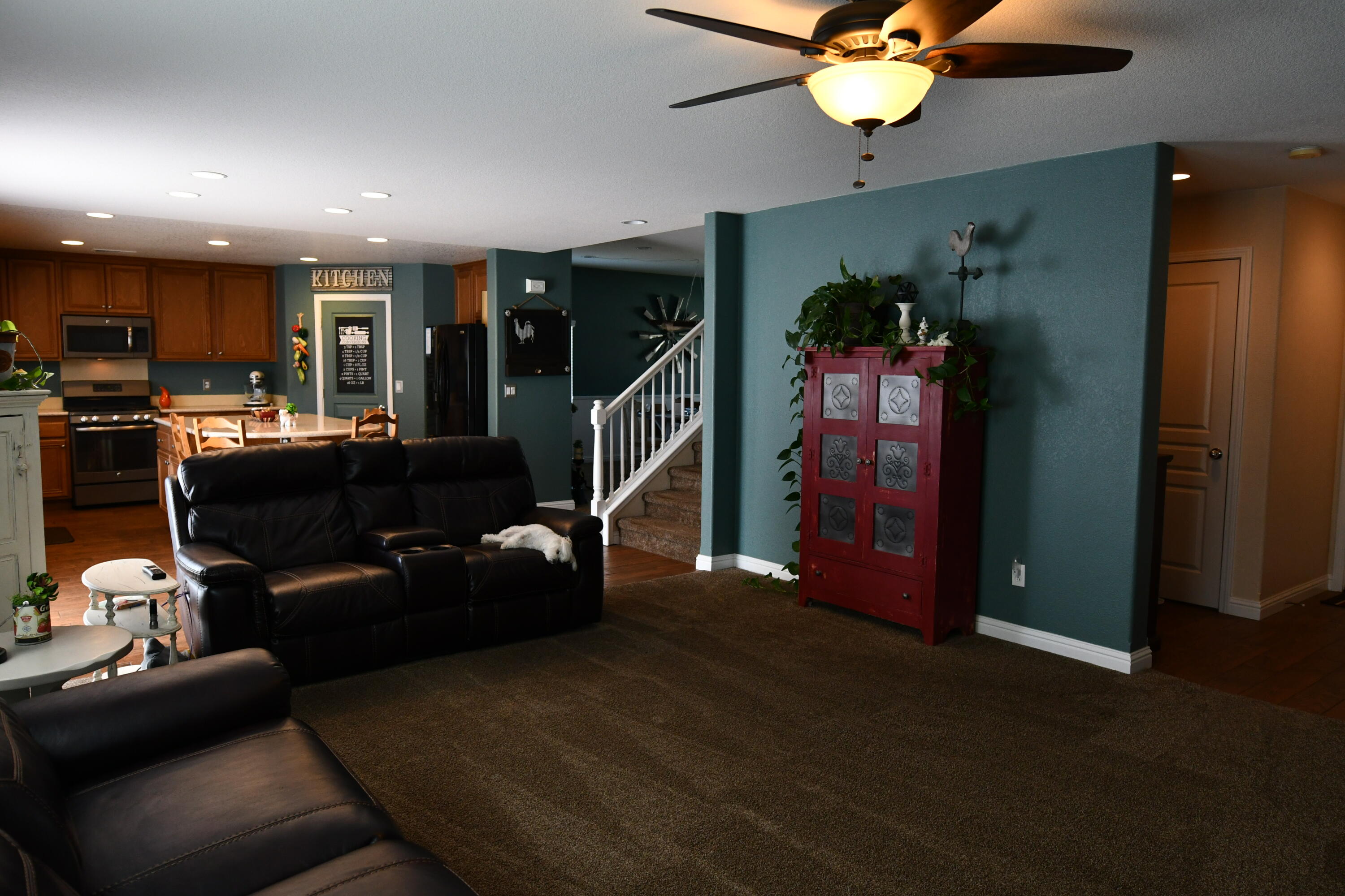 2316 Point Sal Loop Lompoc, CA 93436 - Photo 17 of 36 a living room with furniture and a chandelier