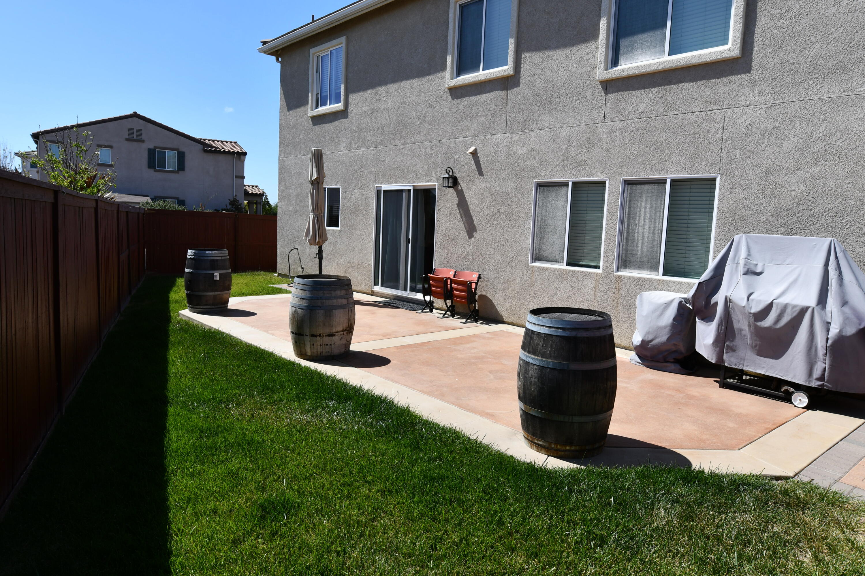 2316 Point Sal Loop Lompoc, CA 93436 - Photo 33 of 36 a view of a patio with table and chairs potted plants
