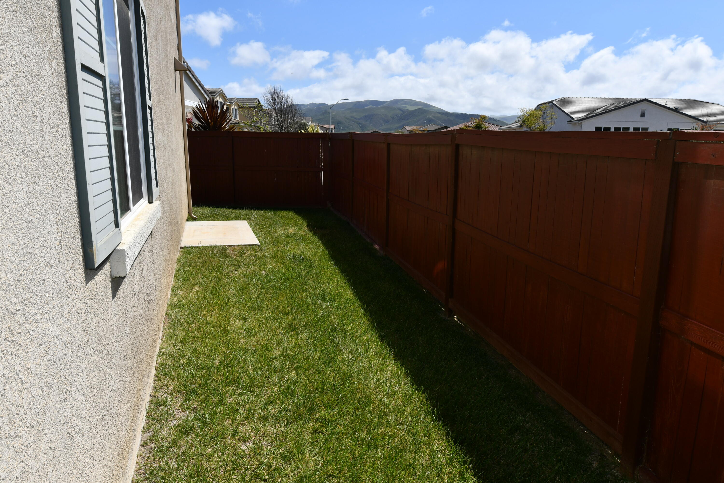 2316 Point Sal Loop Lompoc, CA 93436 - Photo 35 of 36 a view of a yard in front of a house