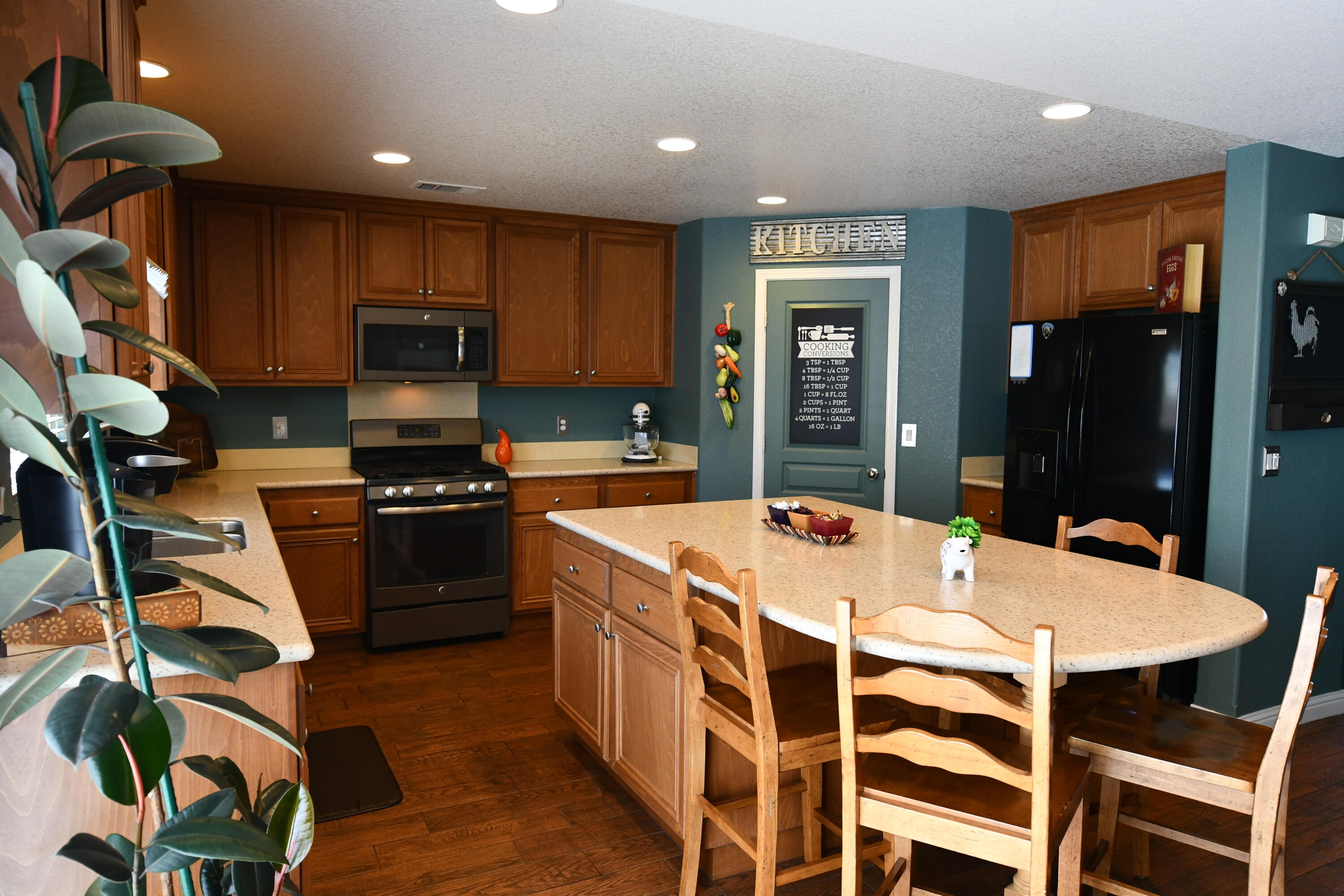 2316 Point Sal Loop Lompoc, CA 93436 - Photo 8 of 36 a kitchen with a stove a sink and a refrigerator